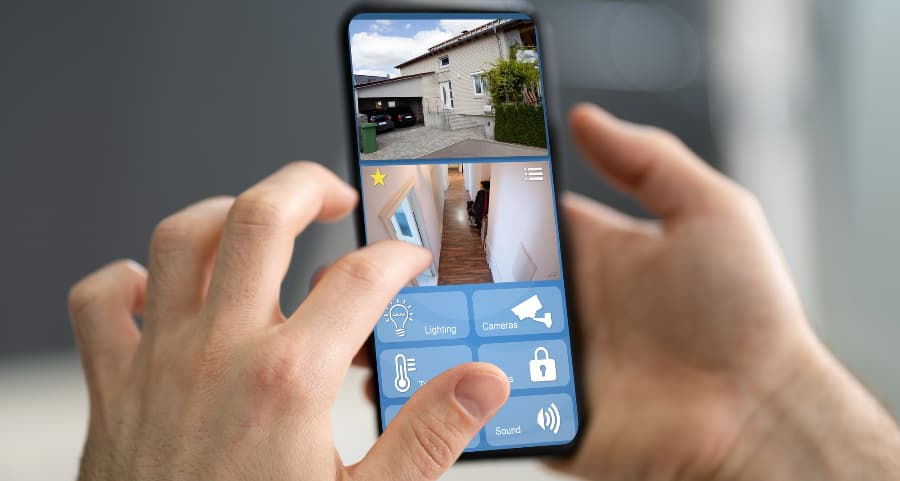 Resident examining video camera footage on a mobile device